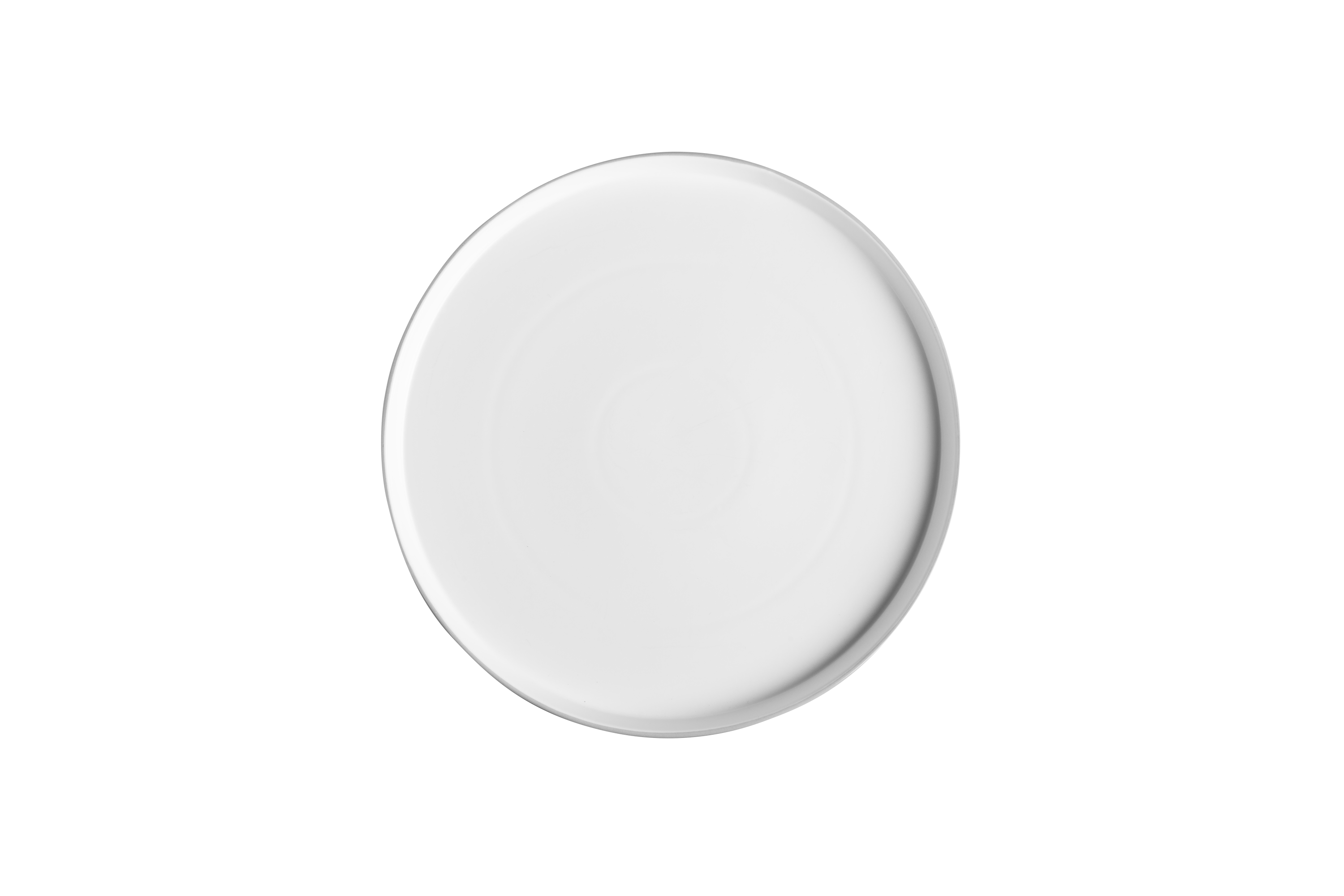 Eine runde, weiße Servierplatte