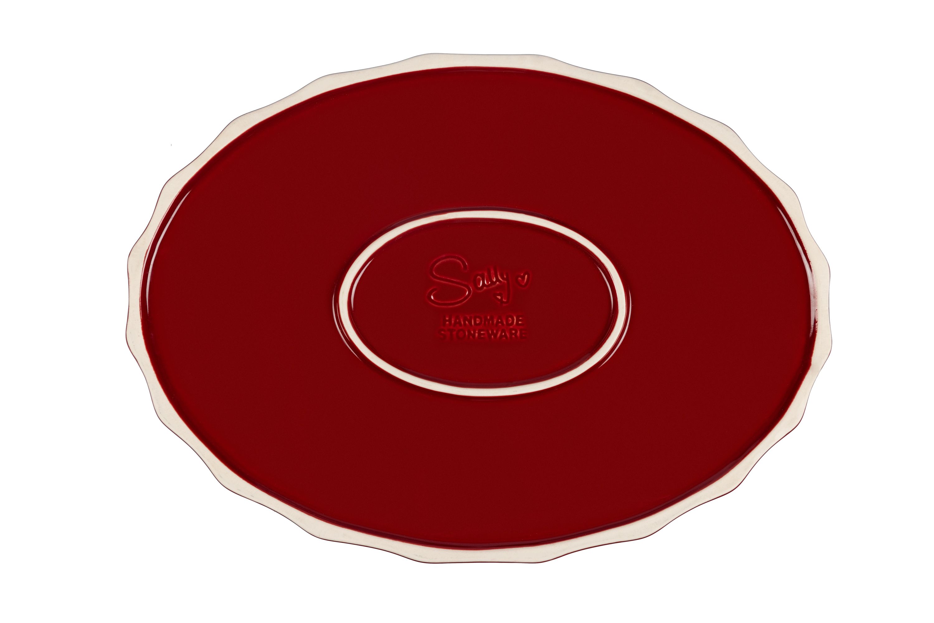Der Boden der roten, ovalen Stoneware-Ofenform